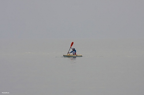 alone in the ocean on a kayak