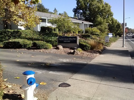 Looking south on Mendocino towards Bicentennial. This is the north driveway. There are two driveways: in case you miss one, look for the other.